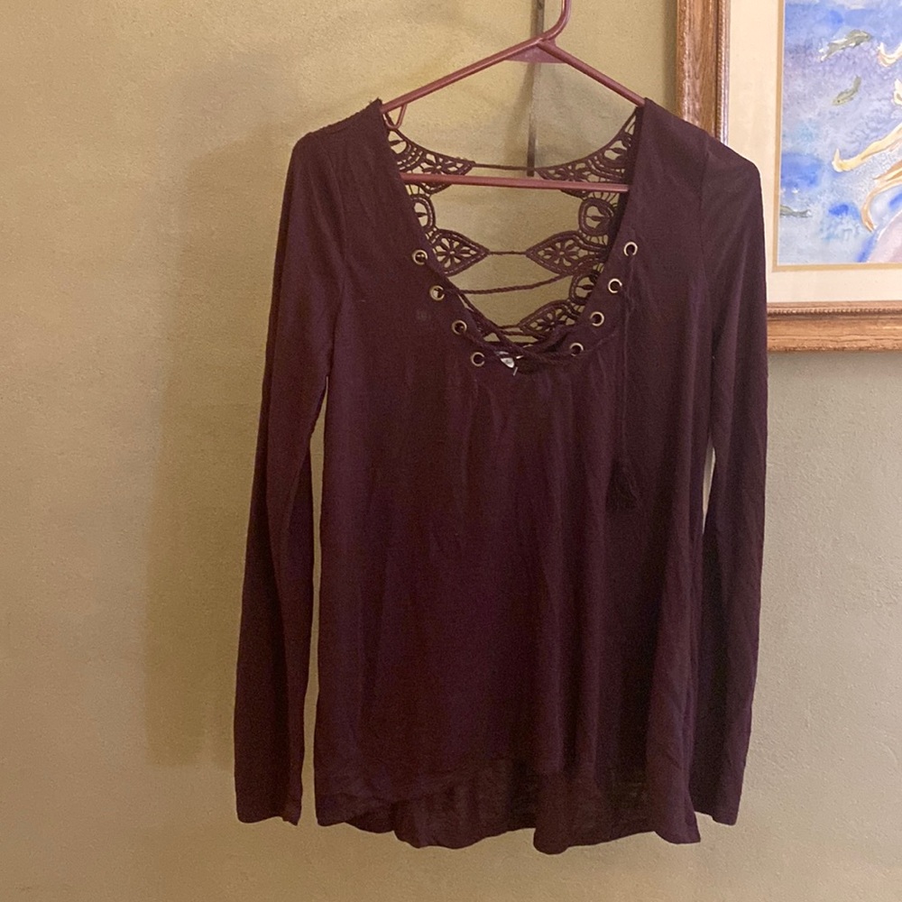 BNWT womens shirt. Lace design on back.